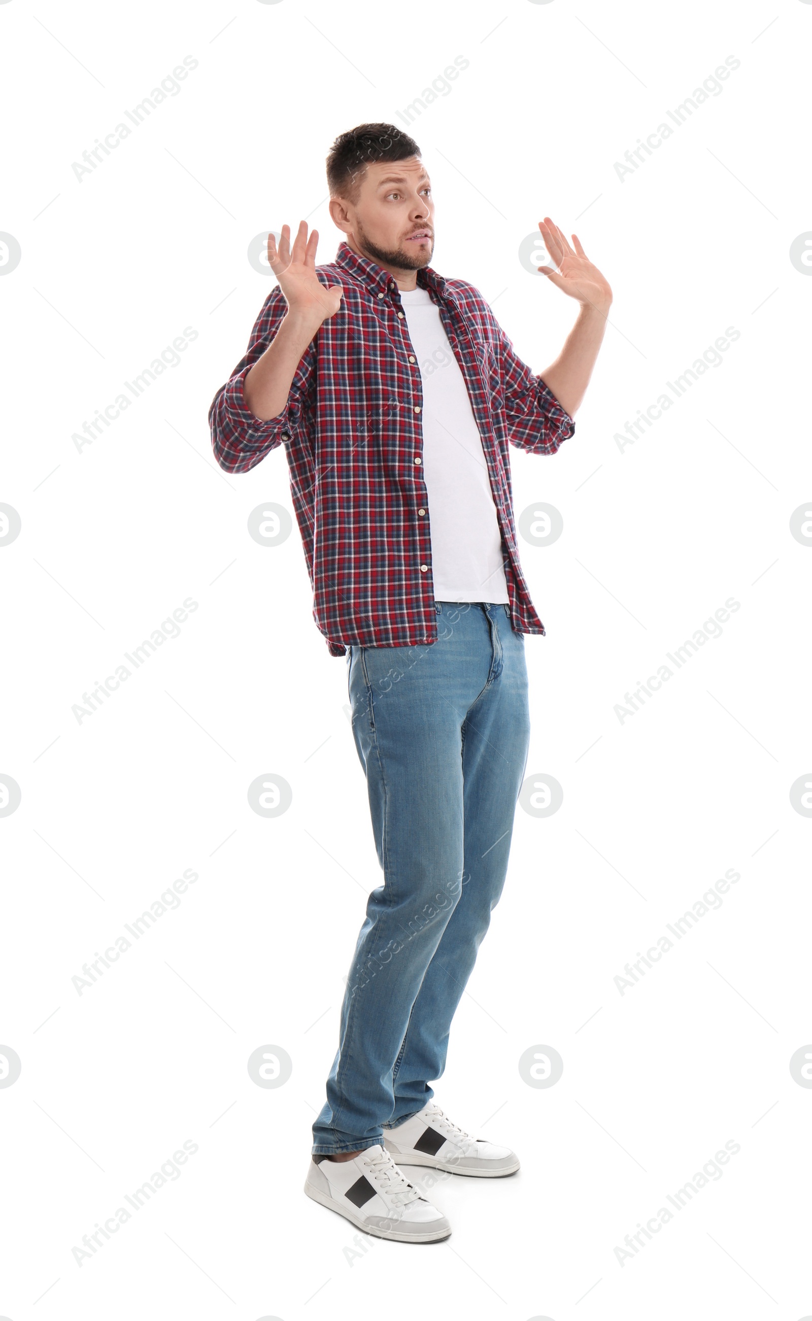 Photo of Emotional man avoiding something on white background