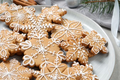 Tasty Christmas cookies on light table, closeup