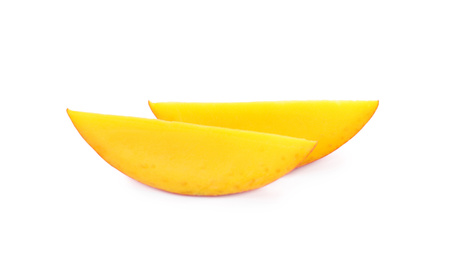 Photo of Slices of ripe mango isolated on white. Exotic fruit