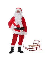 Man in Santa Claus costume with sleigh posing on white background