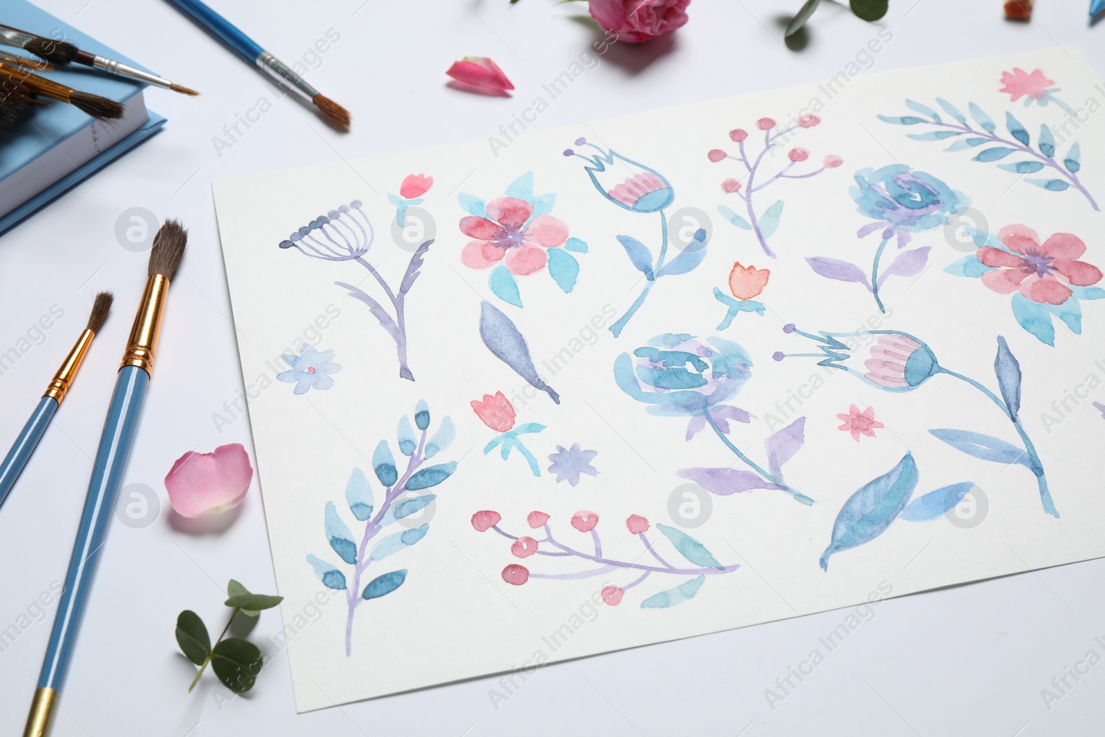 Photo of Composition with floral watercolor picture on white background