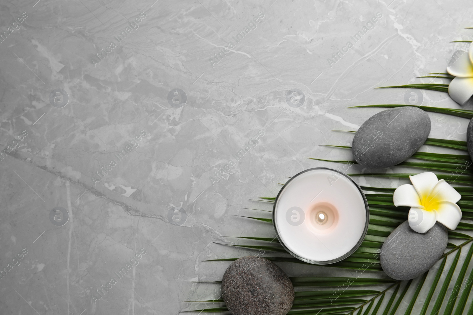 Photo of Flat lay composition with stones on grey marble background, space for text. Zen concept