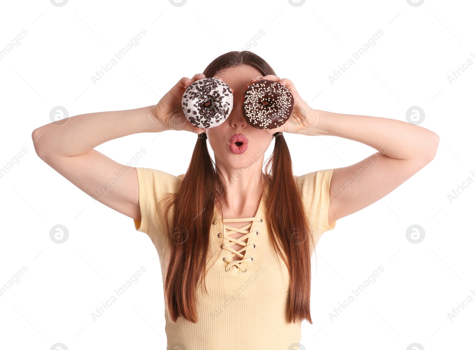 Photo of Beautiful young woman with donuts on white background