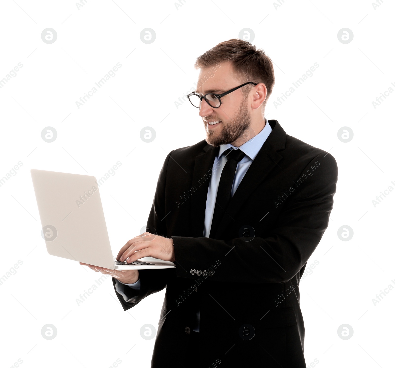 Photo of Happy young businessman using laptop on white background