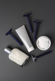 Flat lay composition with shaving accessories for men on grey background