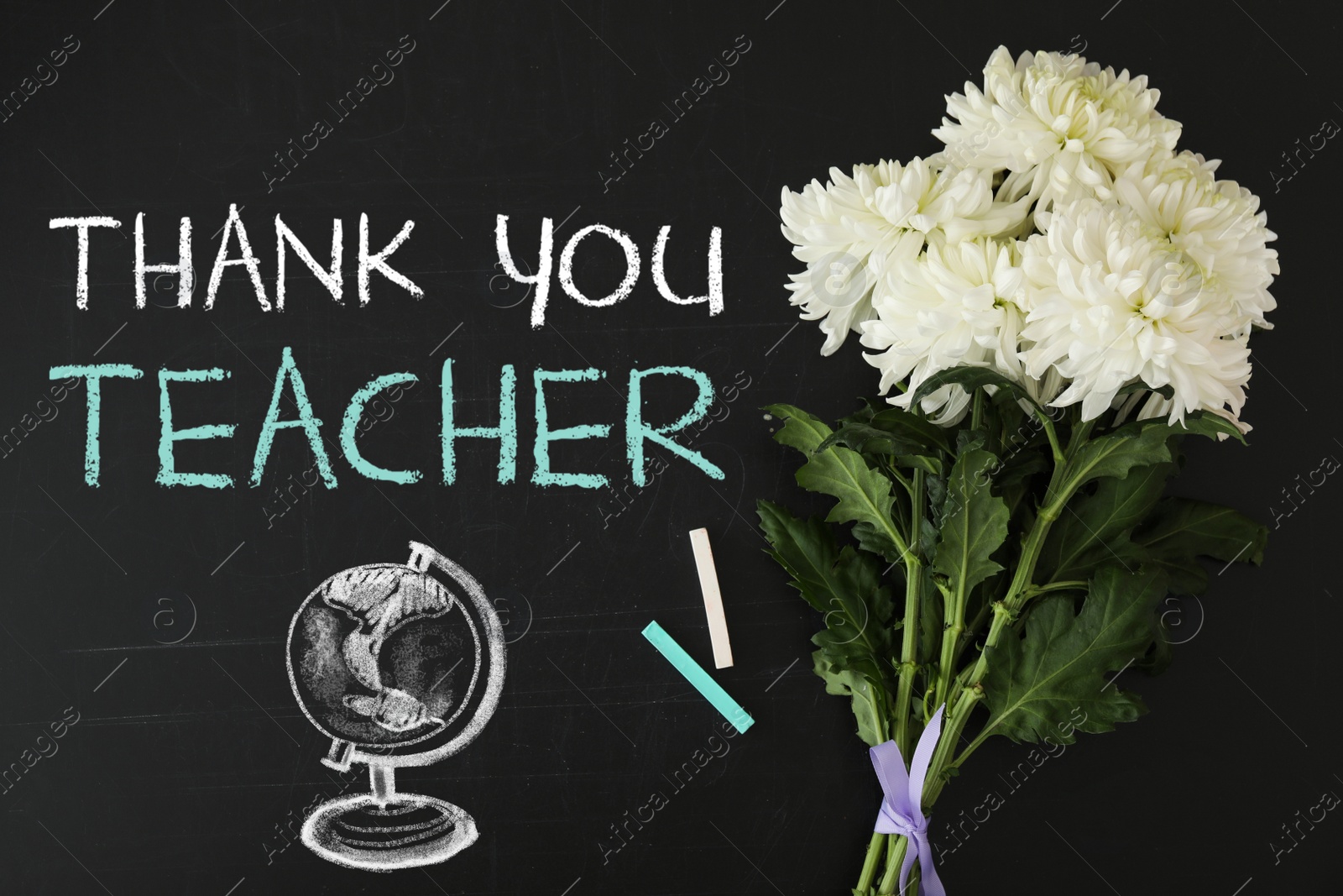 Image of Phrase Thank You Teacher, beautiful flowers and chalk on blackboard, flat lay