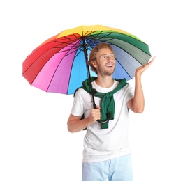 Man with rainbow umbrella on white background