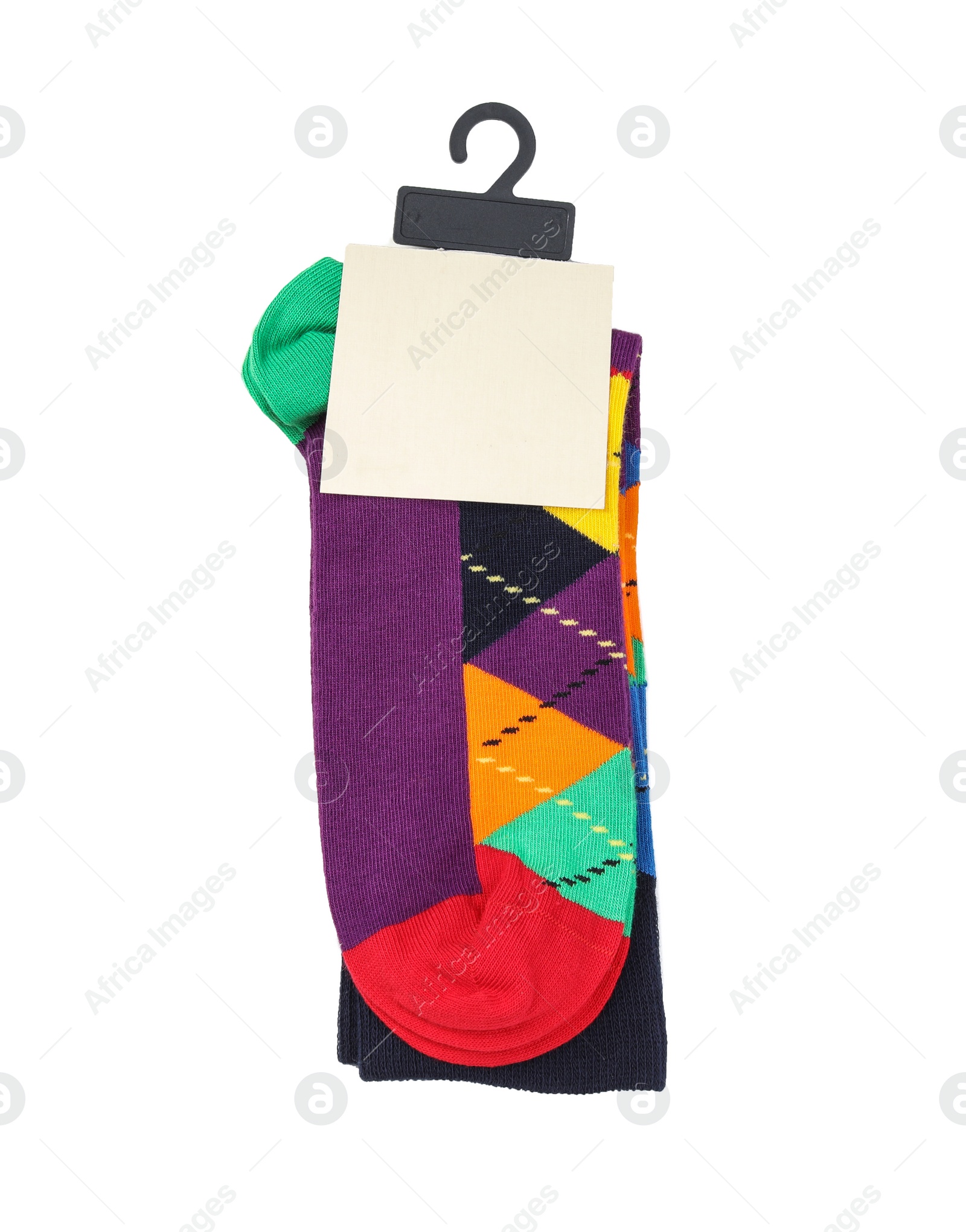 Photo of Colorful socks on white background, top view