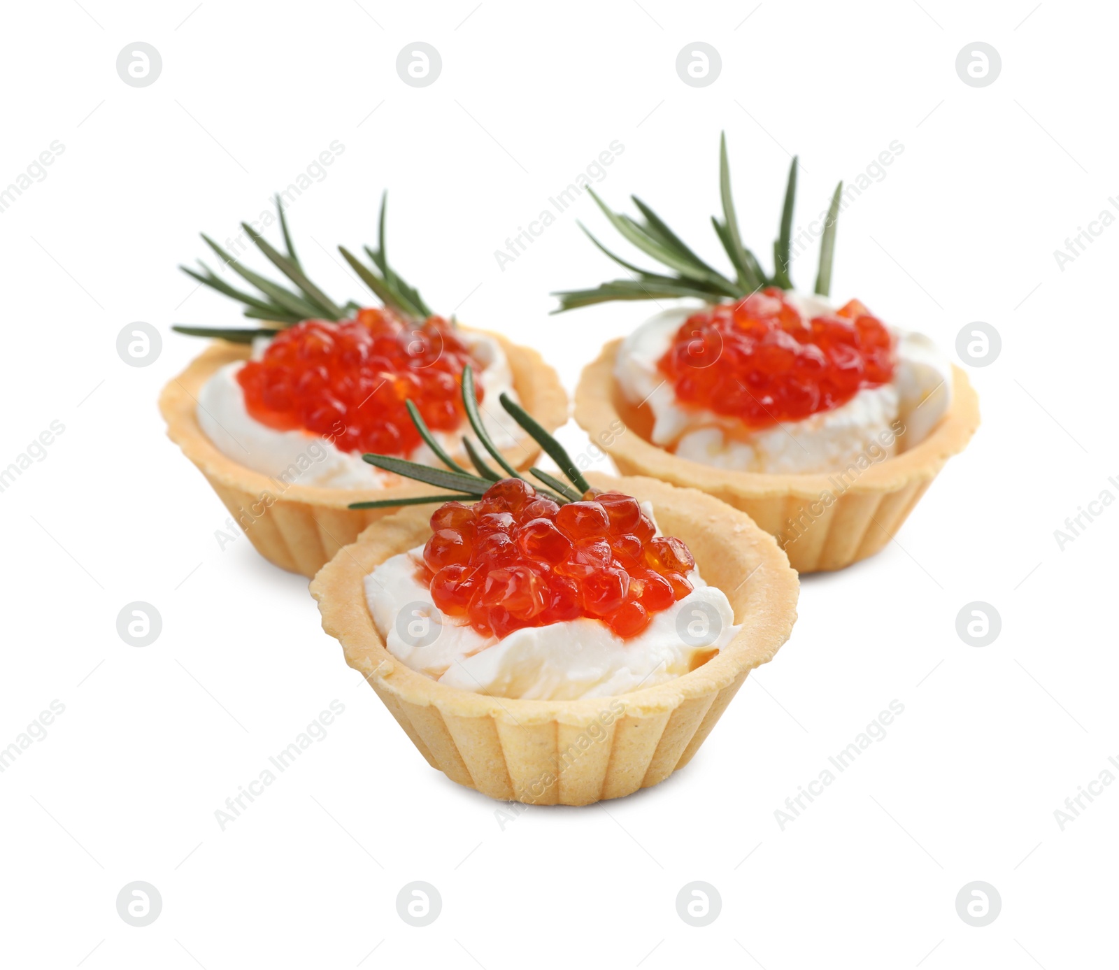 Photo of Delicious tartlets with red caviar and cream cheese on white background