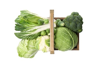 Photo of Wooden crate with different types of fresh cabbage on white background, top view