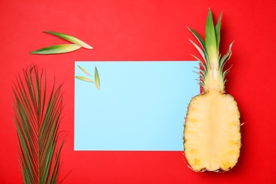 Photo of Fresh pineapple half on color background, flat lay