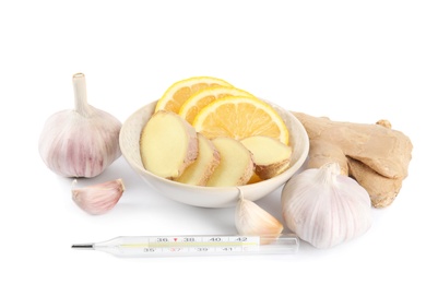 Photo of Composition with garlic and other cold remedies on white background