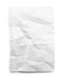 Photo of Crumpled checkered notebook sheet isolated on white, top view
