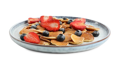Photo of Plate with cereal pancakes and berries isolated on white