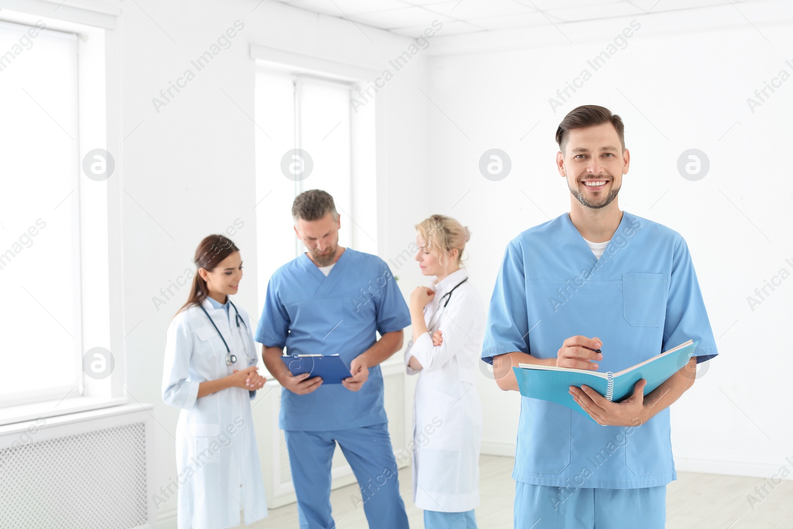 Photo of Doctors and medical assistants in clinic. Health care service