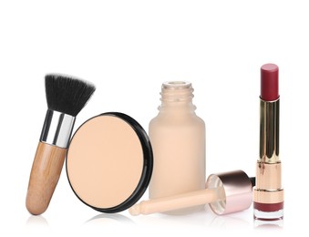 Set with different decorative cosmetics on white background