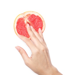 Photo of Young woman touching half of grapefruit on white background, top view. Sex concept