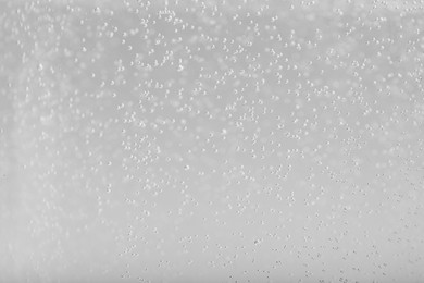 Soda water with bubbles of gas, closeup