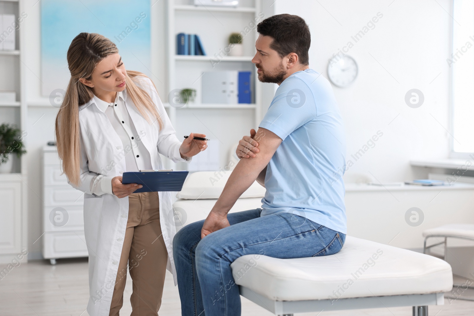 Photo of Professional doctor working with patient in hospital