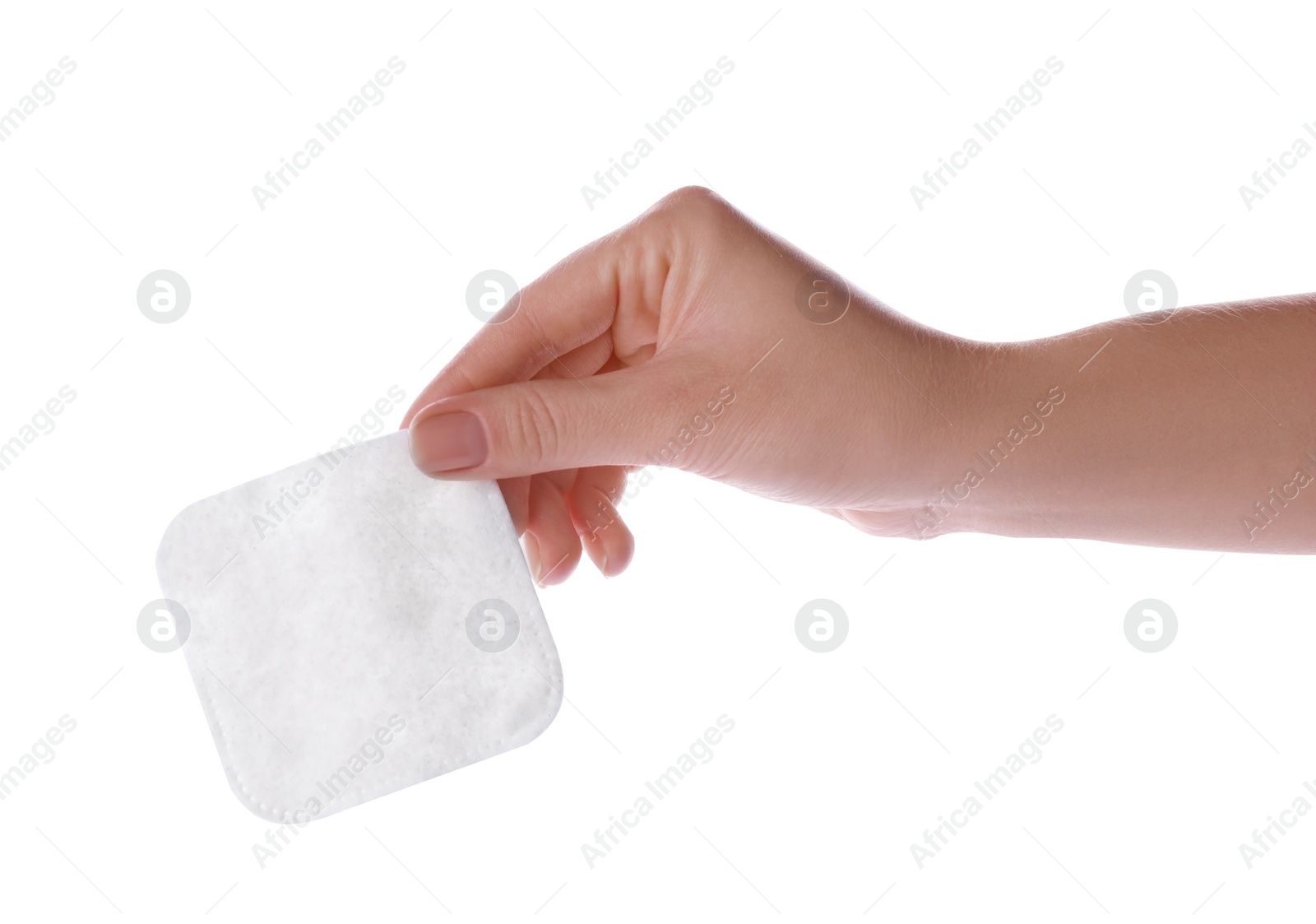 Photo of Woman holding soft clean cotton pad on white background, closeup