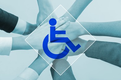 Image of Inclusive workplace culture. International symbol of access. People holding hands together, closeup