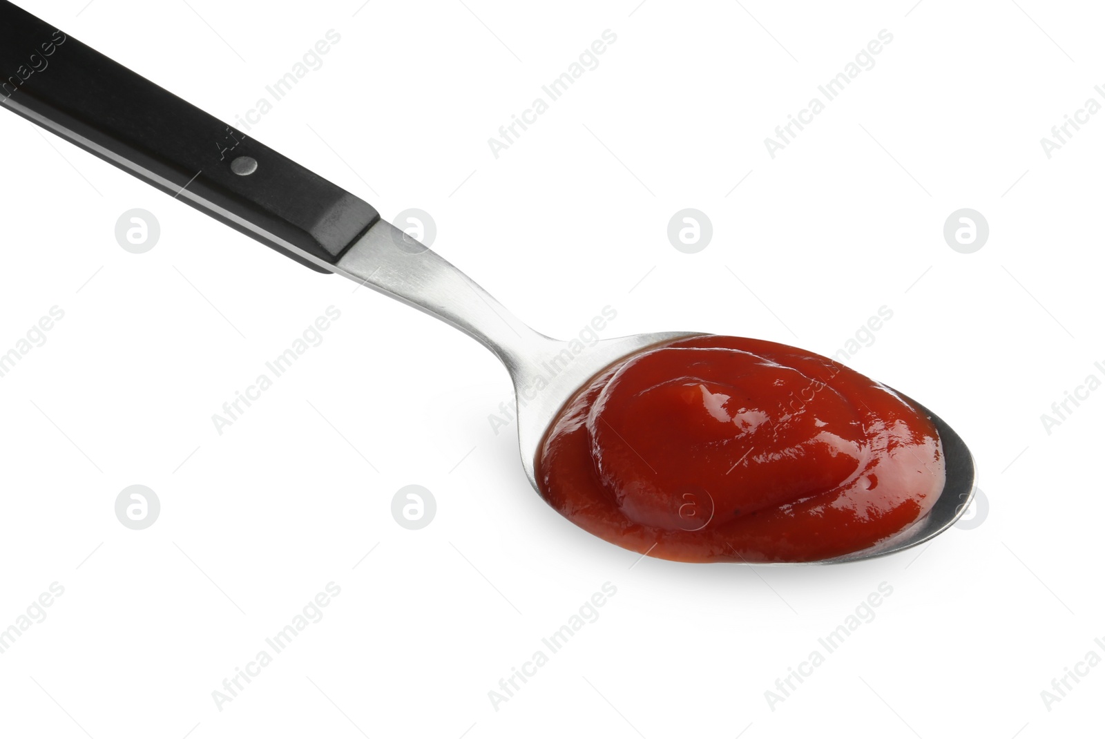 Photo of Tasty ketchup with spoon isolated on white. Tomato sauce