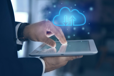 Cloud technology. Businessman using tablet, closeup 