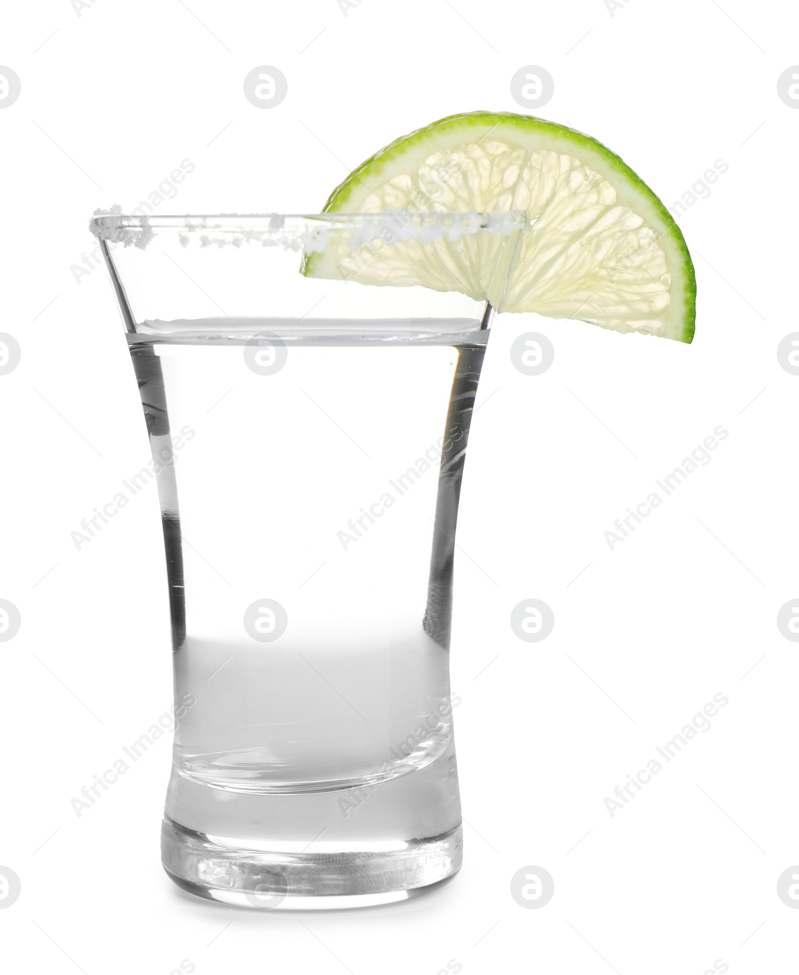 Photo of Mexican Tequila shot with salt and lime slice isolated on white