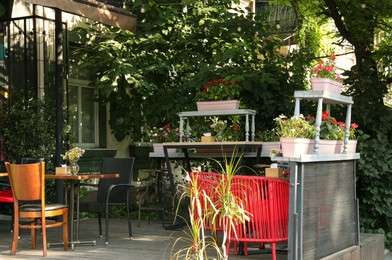 Photo of Beautiful view of modern cafe with outdoor terrace