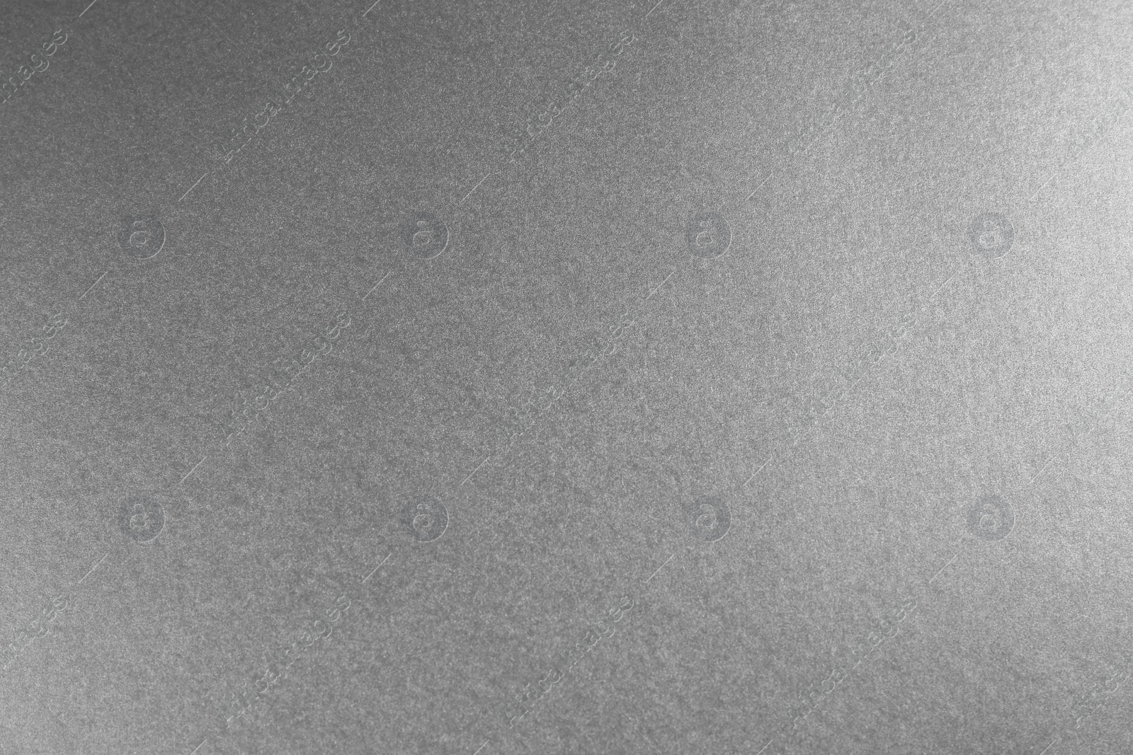 Photo of Closeup view of silver surface as background