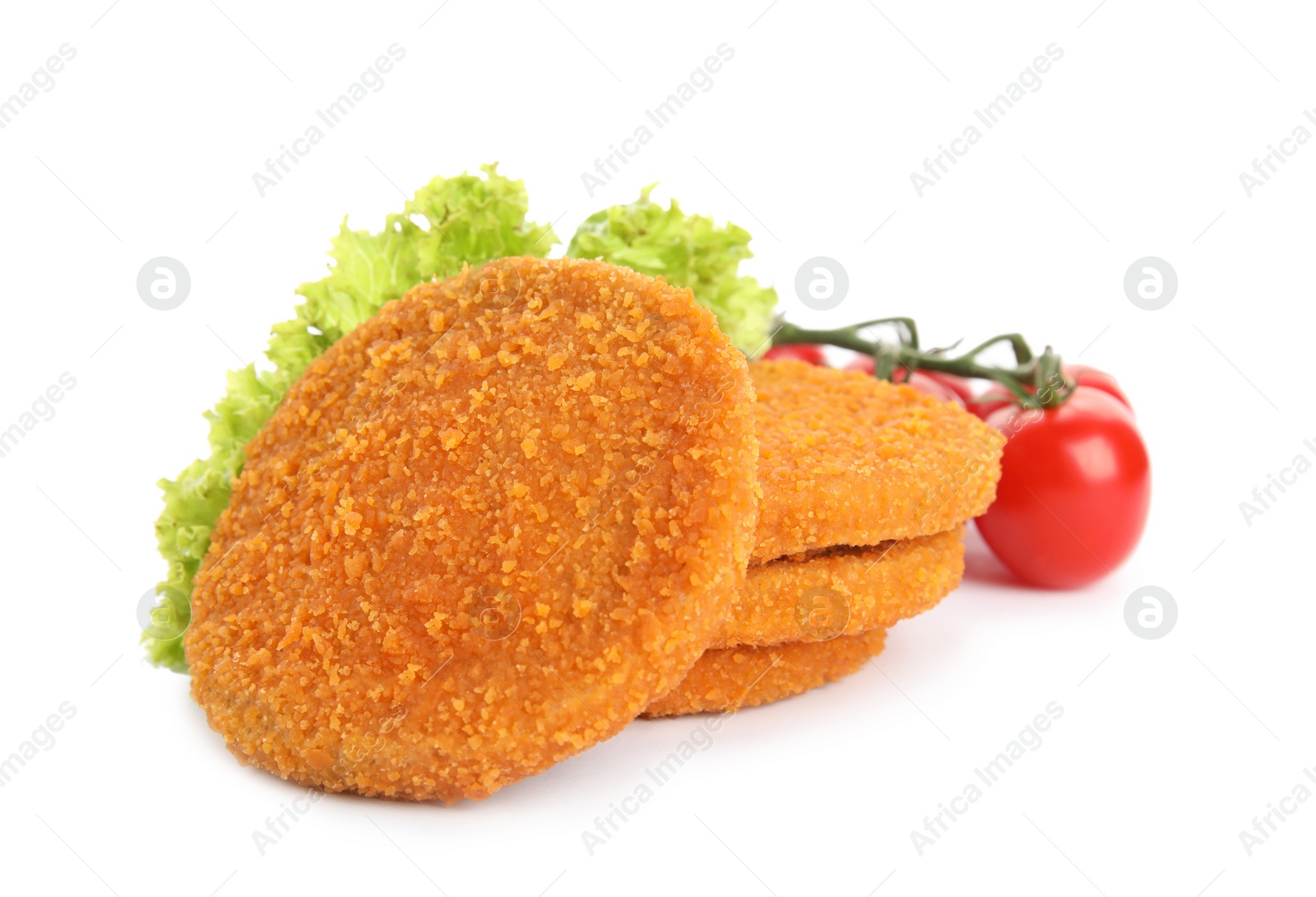 Photo of Delicious fried breaded cutlets with cherry tomatoes and lettuce on white background