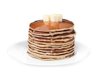 Stack of tasty pancakes with butter and honey on white background