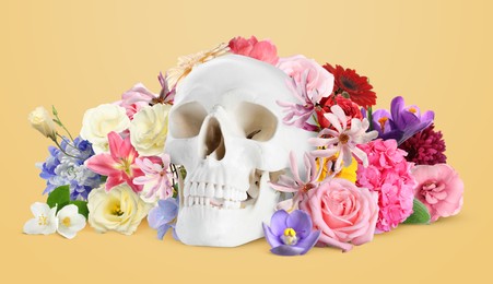 Image of White skull and different beautiful flowers on yellow background
