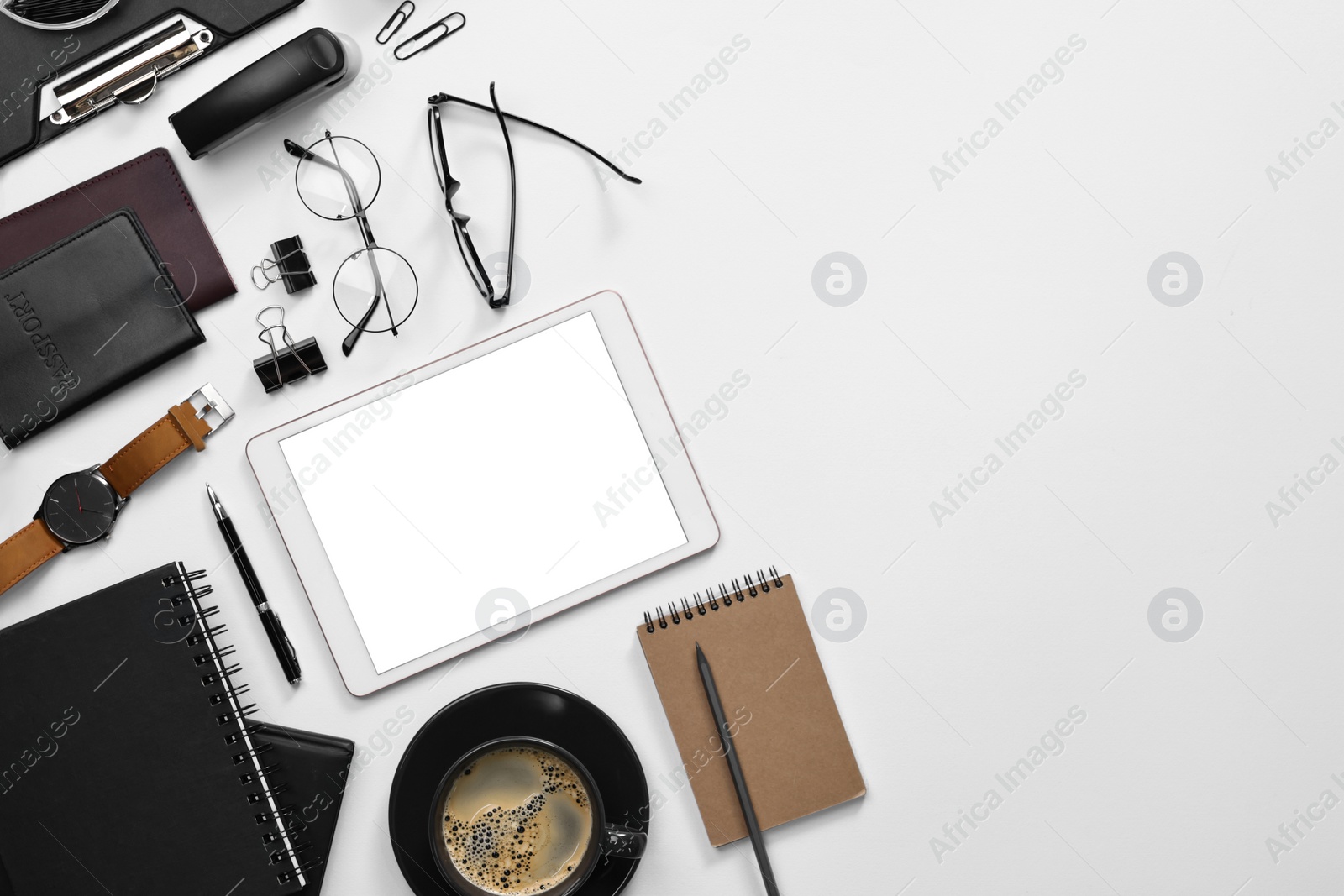 Photo of Flat lay composition with modern tablet on white background. Space for text