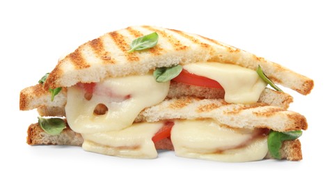 Photo of Delicious grilled sandwiches with mozzarella, tomatoes and basil isolated on white