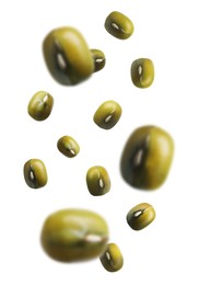 Image of Raw mung beans falling on white background