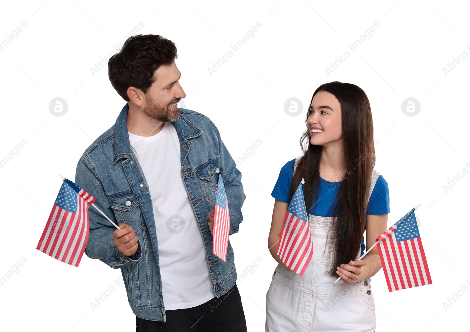 Image of 4th of July - Independence day of America. Happy father and his daughter with national flags of United States on white background