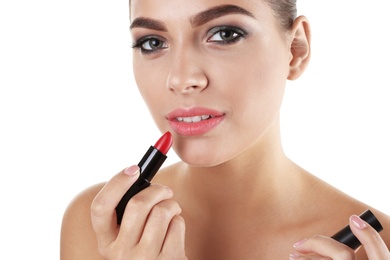 Portrait of beautiful woman with lipstick on white background. Stylish makeup