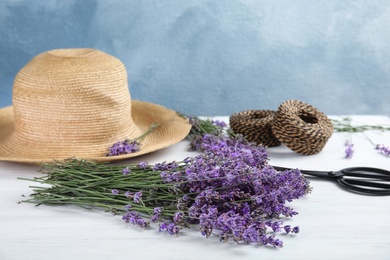 Photo of Composition with lavender flowers on light background