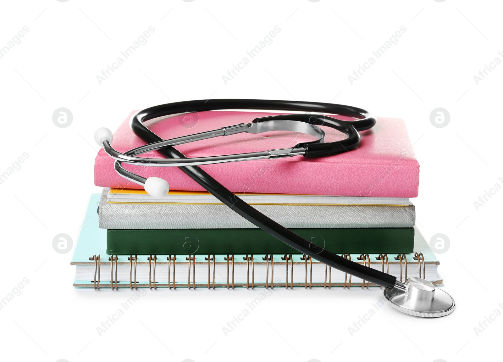 Photo of Stethoscope and notebooks on white background. Medical students stuff