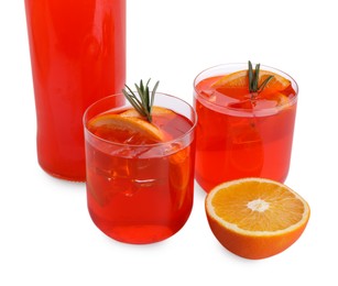 Photo of Aperol spritz cocktail, orange slices and rosemary in glasses isolated on white