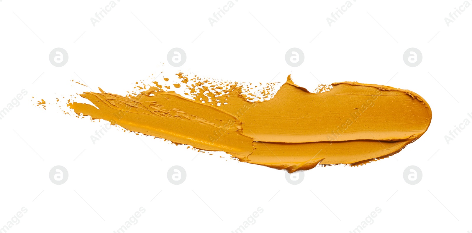 Photo of Light brown oil paint stroke on white background, top view