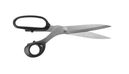 Photo of Pair of sharp sewing scissors on white background