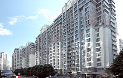 KYIV, UKRAINE - MAY 21, 2019: Beautiful view of modern housing estate in Pecherskyi district on sunny day