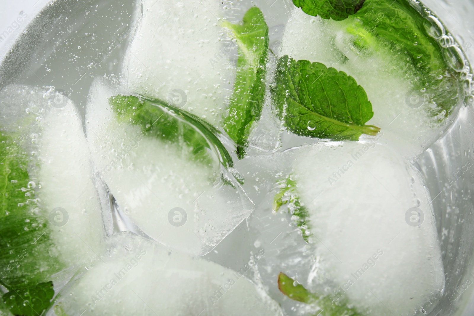 Photo of Drink with mint and ice cubes, top view