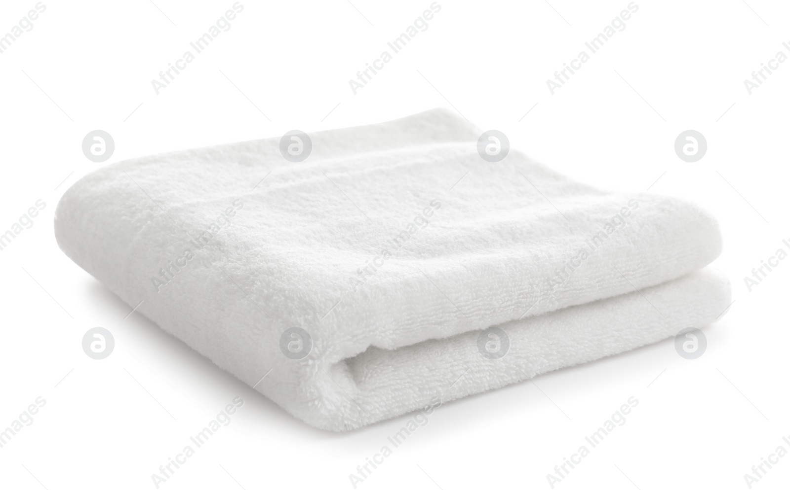 Photo of Folded clean soft towel on white background