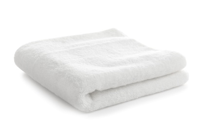 Photo of Folded clean soft towel on white background