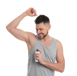 Photo of Handsome man applying deodorant isolated on white