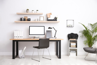 Image of Home workplace with modern computer and desk in room. Mockup for design