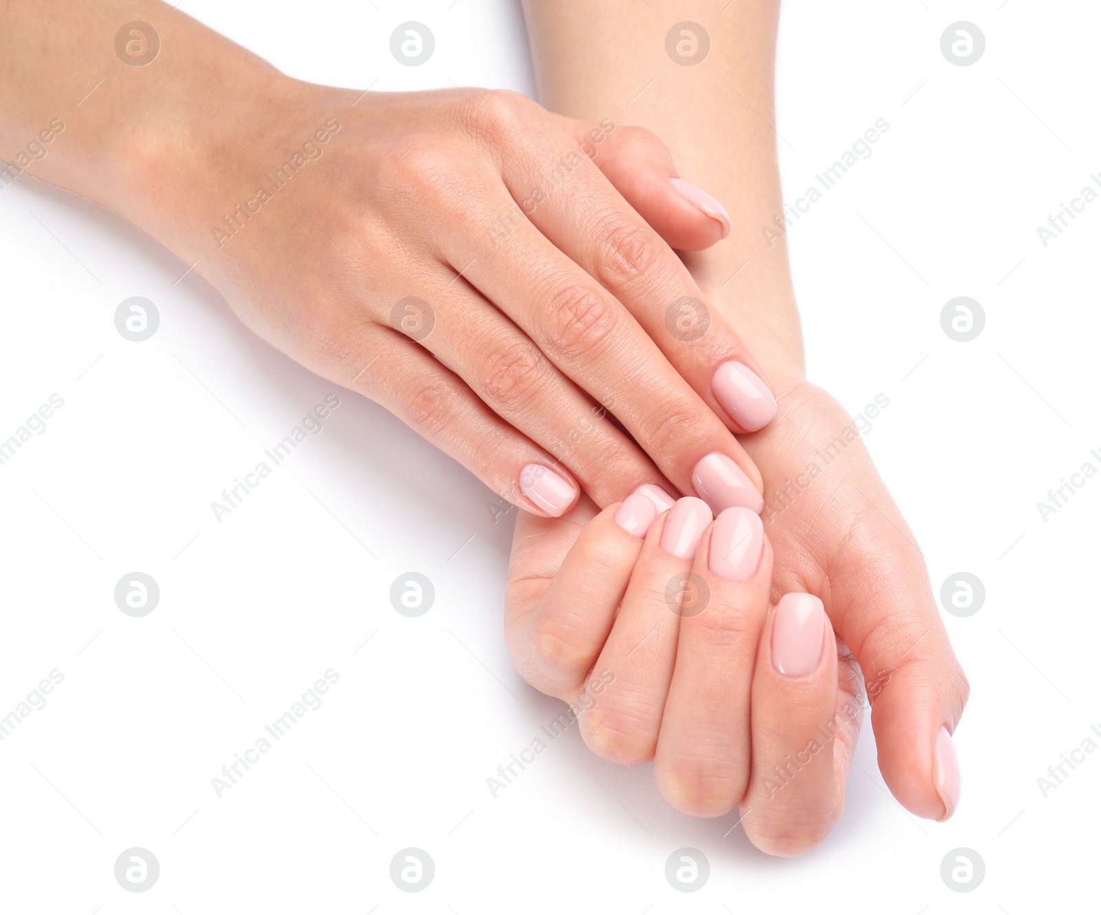 Photo of Woman with beautiful hands on white background, closeup. Spa treatment